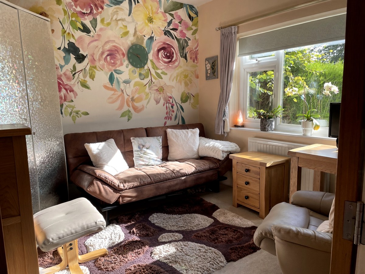 A wide view of Catherine's calm, softly furnished counselling room.